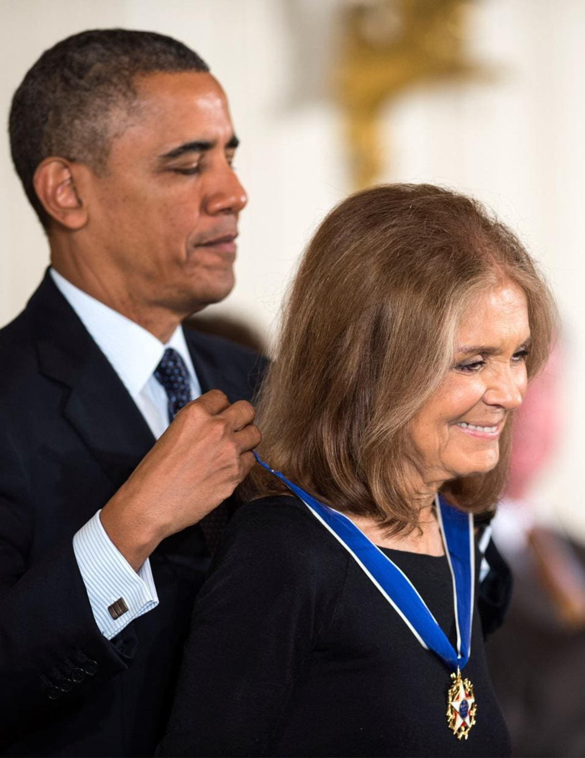 Gloria receiving the Presidential Medal of Freedom from President Barack Obama