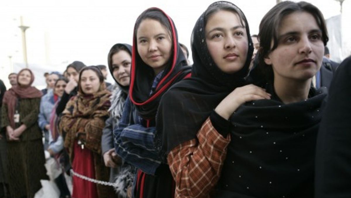 Women of Afghanistan stand outside the U.S. Embassy in Kabul, Wednesday, March 1, 2006. Photo by Eric Draper.